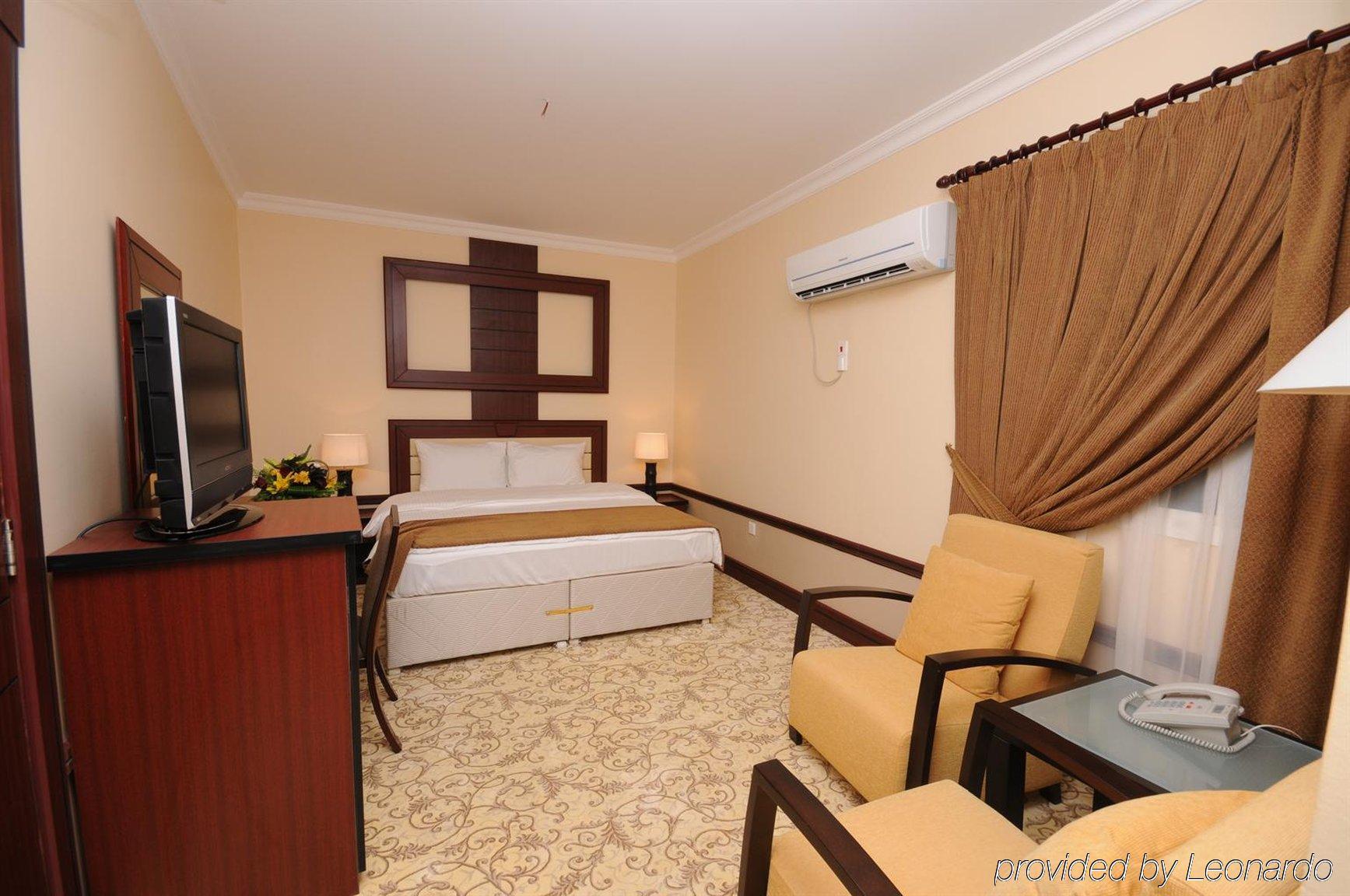 La Villa Palace Hotel Doha Quarto foto
